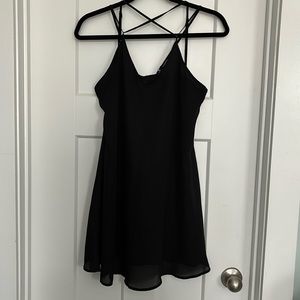 Very J scrappy little black dress. Lined. Size M. 36 inches across at chest